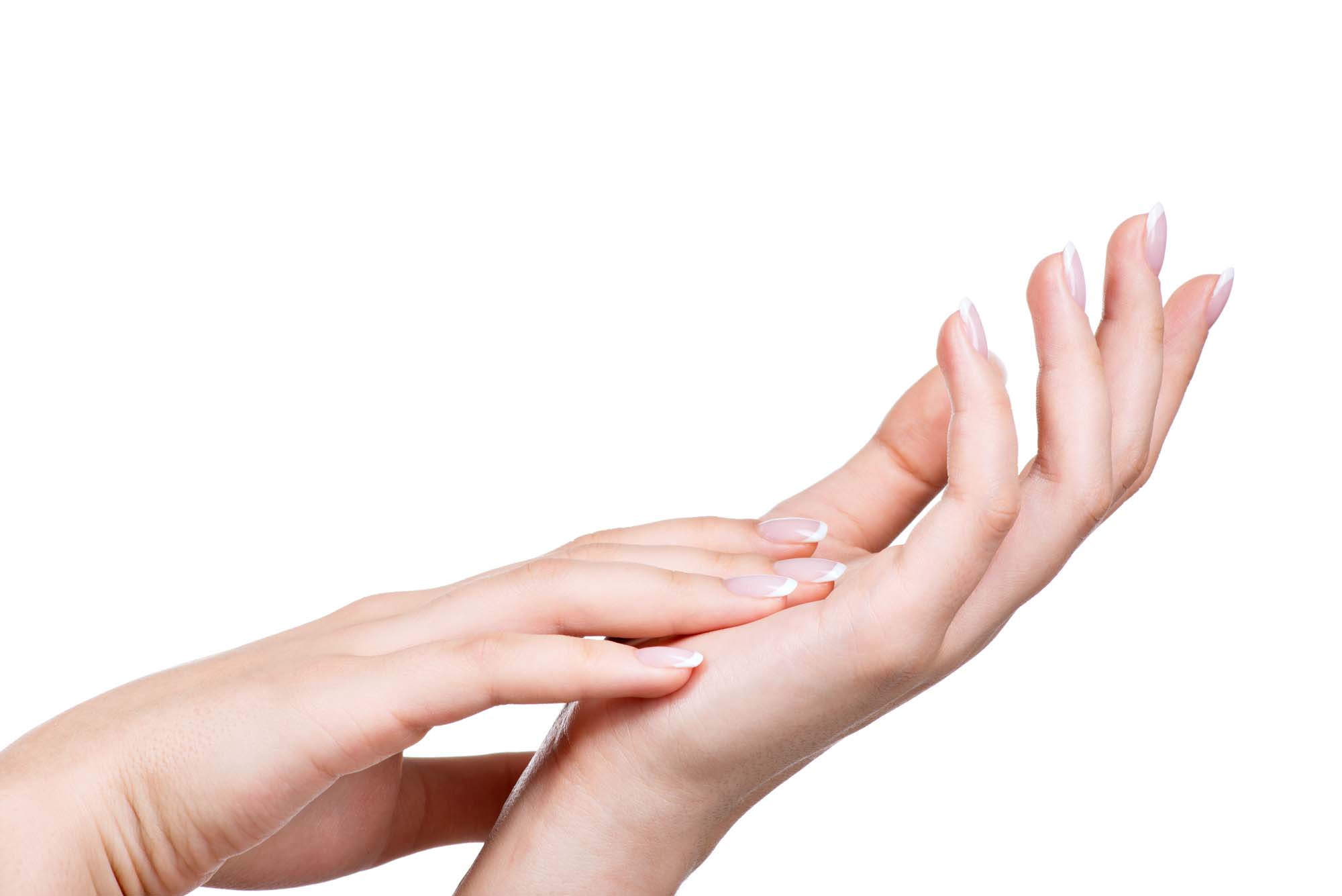 Beautiful woman's hands with beautiful nails after manicure salon with french manicure